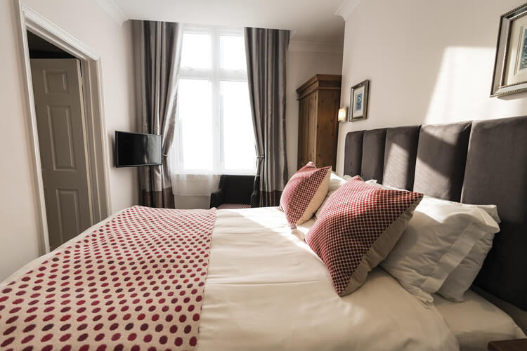 Bright bedroom ready for a slow morning